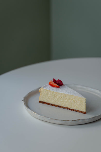 Kuchenstück Gebackene Topfentorte