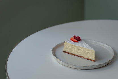 Kuchenstück Gebackene Topfentorte
