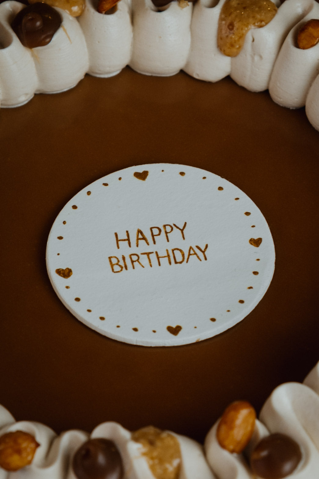 Schild auf Torte